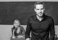 Man well groomed attractive teacher in front of classroom. Obsessed with knowledge. Teacher of her dreams. Handsome Royalty Free Stock Photo