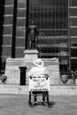 Man in Wheelchair With Attached Sign at Immigration Rally