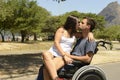 Man in wheelchair and girlfriend