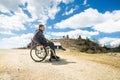 Man in wheelchair outside in nature