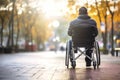 Man in Wheelchair Sitting on Sidewalk Royalty Free Stock Photo