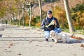 Man white small dog walk park Royalty Free Stock Photo