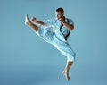 Man in white kimono training karate Royalty Free Stock Photo