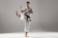 Man in white kimono training karate Royalty Free Stock Photo