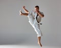 Man in white kimono training karate Royalty Free Stock Photo