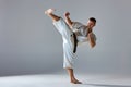 Man in white kimono training karate Royalty Free Stock Photo