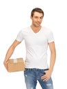 Man in white shirt with parsel Royalty Free Stock Photo