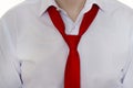 A man in a white shirt and red tie, tie is not tied up, close-up, businessman