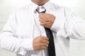 Man in white shirt taking off neck tie Royalty Free Stock Photo