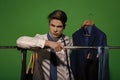 Man in white shirt, tie with jacket on hanger Royalty Free Stock Photo