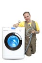 The man who has thought of repair or connection of the washing machine near the new washing machine Royalty Free Stock Photo