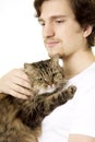 Man who keeps on hand fluffy cat Royalty Free Stock Photo