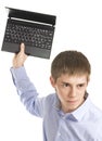 Man who is triying to break a laptop Royalty Free Stock Photo