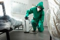 Disinfecting the room with chemicals in portable tank stock photo