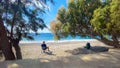 Man on a wild beach. Aegean sandy shore. Caria hiking trail. Turkey.