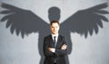 Man with winged shadow Royalty Free Stock Photo