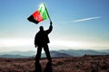 Man winner waving Afganistan flag