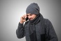 Man in winterwear talking on the phone Royalty Free Stock Photo