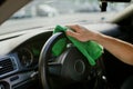 Man wipes car interior with a rag, hand auto wash Royalty Free Stock Photo