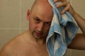 Man, wiping his head with a towel Royalty Free Stock Photo