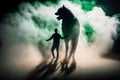Man and wolf in the smoke. Halloween concept. Selective focus Royalty Free Stock Photo