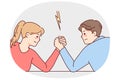 Man and woman arm wrestle Royalty Free Stock Photo