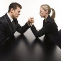 Man and woman arm wrestling Royalty Free Stock Photo