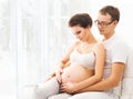 Man and woman awaiting a baby. Family at home Royalty Free Stock Photo