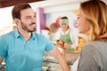 Man and woman in bakery taking ice cream Royalty Free Stock Photo
