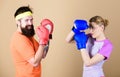 Man and woman in boxing gloves. Boxing sport concept. Couple girl and hipster practicing boxing. Sport for everyone Royalty Free Stock Photo