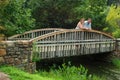 Man and Woman on a Bridge Royalty Free Stock Photo