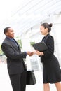 Man and Woman Business Team Handshake Royalty Free Stock Photo