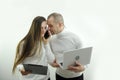 man and woman business work boss and subordinate in hands laptop tablet phone problem solving talking on the phone on a Royalty Free Stock Photo