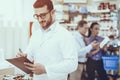 Man and woman buys a medicaments in pharmacy Royalty Free Stock Photo