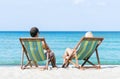 Man and woman chilling on a summer beach Royalty Free Stock Photo