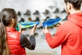 Man and woman choosing shoes for hiking Royalty Free Stock Photo