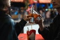 Man and woman clinking with bottles with beverages while sitting at the table Royalty Free Stock Photo