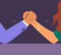 Man and woman compete in arm wrestling Royalty Free Stock Photo