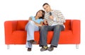 Man And Woman On Couch Watching Television Royalty Free Stock Photo