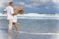 Man and Woman Couple Having Fun Dancing On A Beach Royalty Free Stock Photo