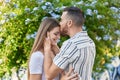 Man and woman couple hugging each other kissing at park Royalty Free Stock Photo