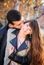 Man woman couple kissing portrait sunny