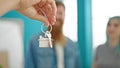 Man and woman couple receiving keys of real state agent at new home Royalty Free Stock Photo