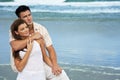 Man and Woman Couple In Romantic Embrace On Beach Royalty Free Stock Photo