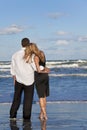 Man and Woman Couple In Romantic Embrace On Beach Royalty Free Stock Photo