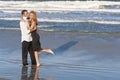 Man and Woman Couple In Romantic Embrace On Beach Royalty Free Stock Photo