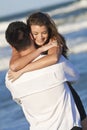 Man and Woman Couple In Romantic Embrace On Beach Royalty Free Stock Photo