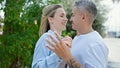 Man and woman couple smiling confident dancing at park Royalty Free Stock Photo