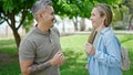 Man and woman couple smiling confident dancing at park Royalty Free Stock Photo