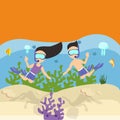 Man woman couple snorkeling scuba diving under water sea coral reef Royalty Free Stock Photo